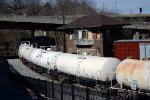 NS yard job E19 pauses next to "X Tower" which in the old days guarded the crossing of the original routes of the Southern and N&W.